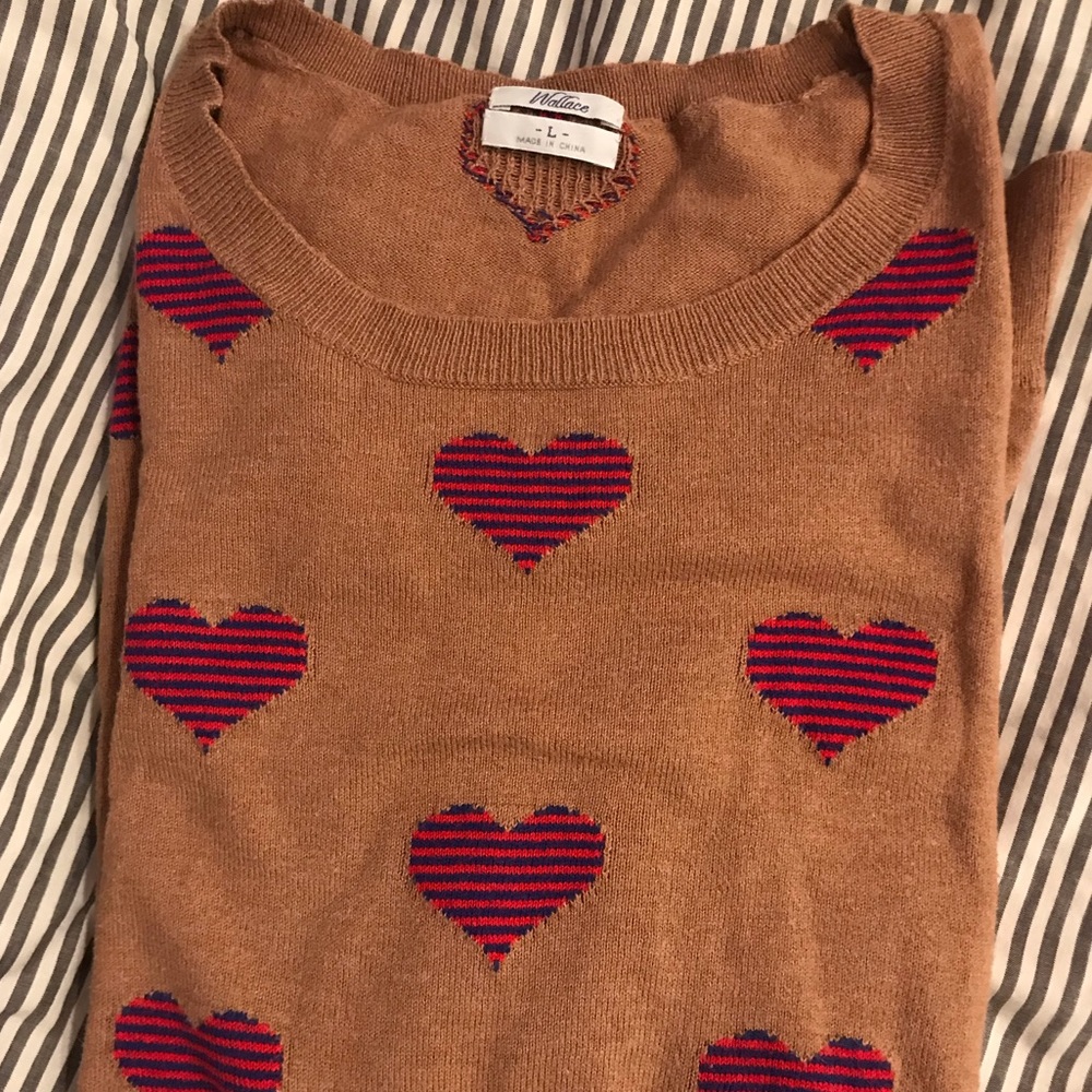Pullover sweater with heart embroidery